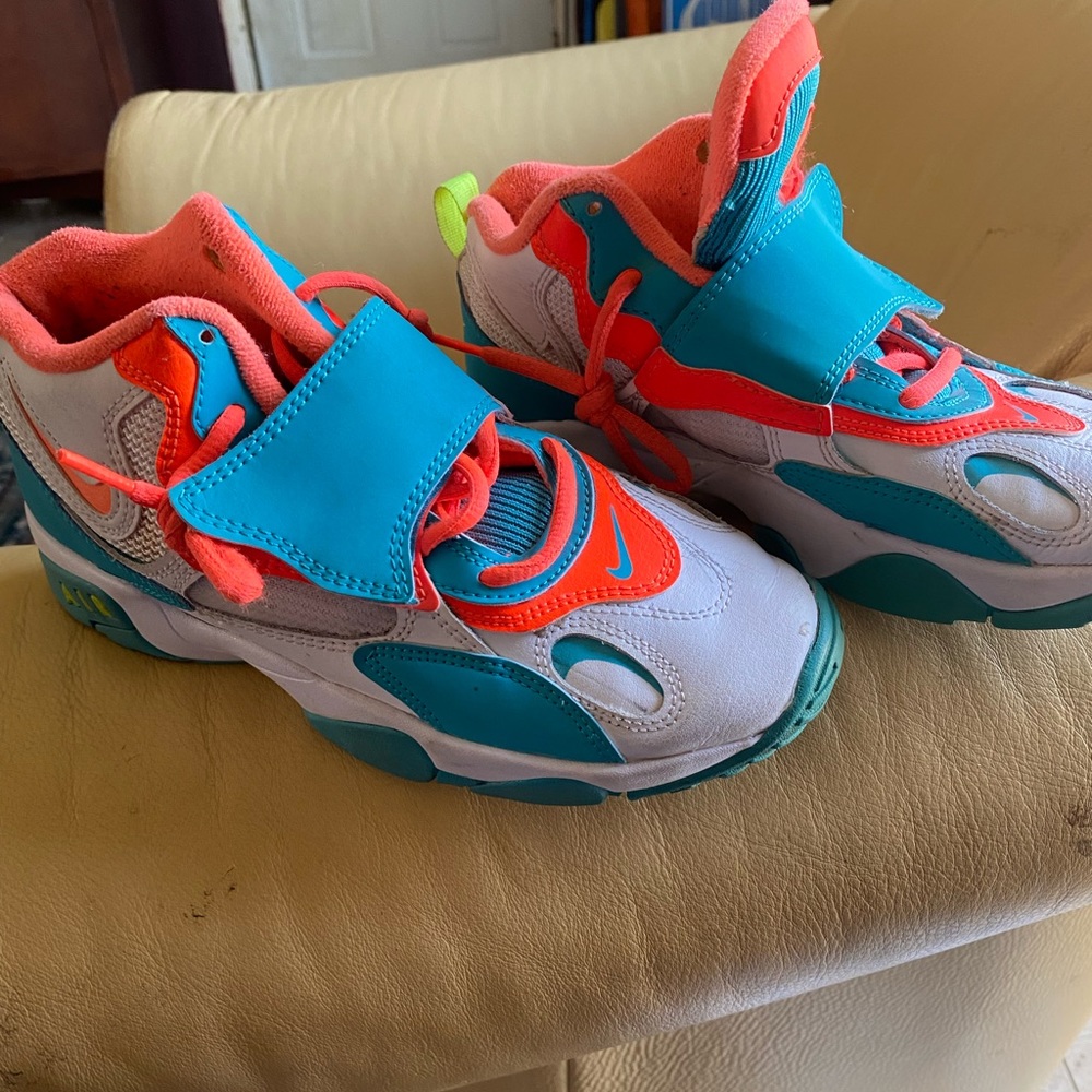 One pair of Nike girls tennis shoes.